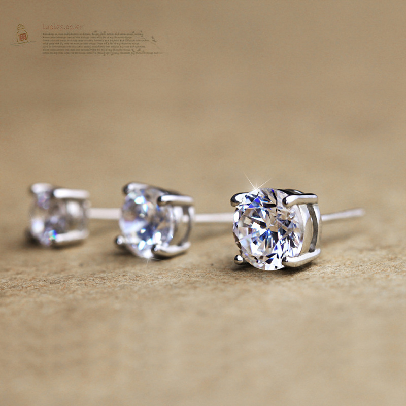7Four Claw Earrings